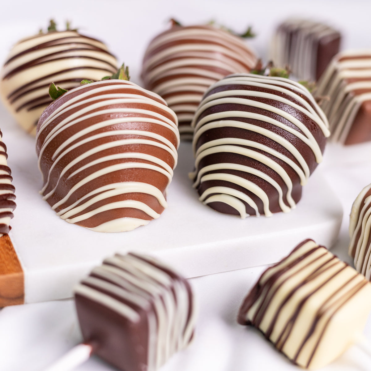 Gourmet Hand-Dipped Belgian Chocolate Strawberries & Cheesecake Pops